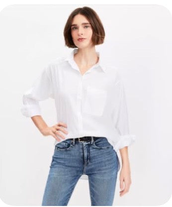The Timeless White Button-Down: A True Wardrobe Essential.